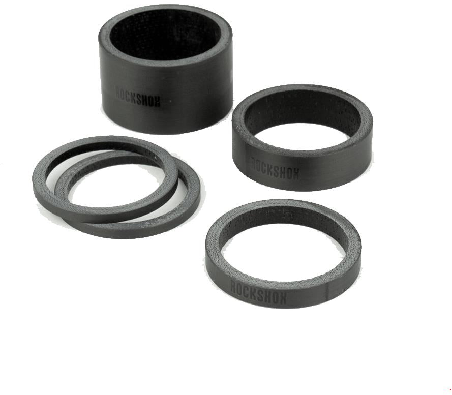 RockShox Carbon Spacer Set: five UD carbon headset spacers for 1 1/8" steerer tubes, assorted thicknesses.