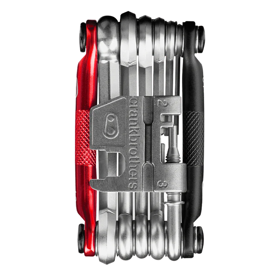 The Crankbrothers M17 Multi-Tool (Black/Red) is a compact bike tool with wrenches and screwdrivers.